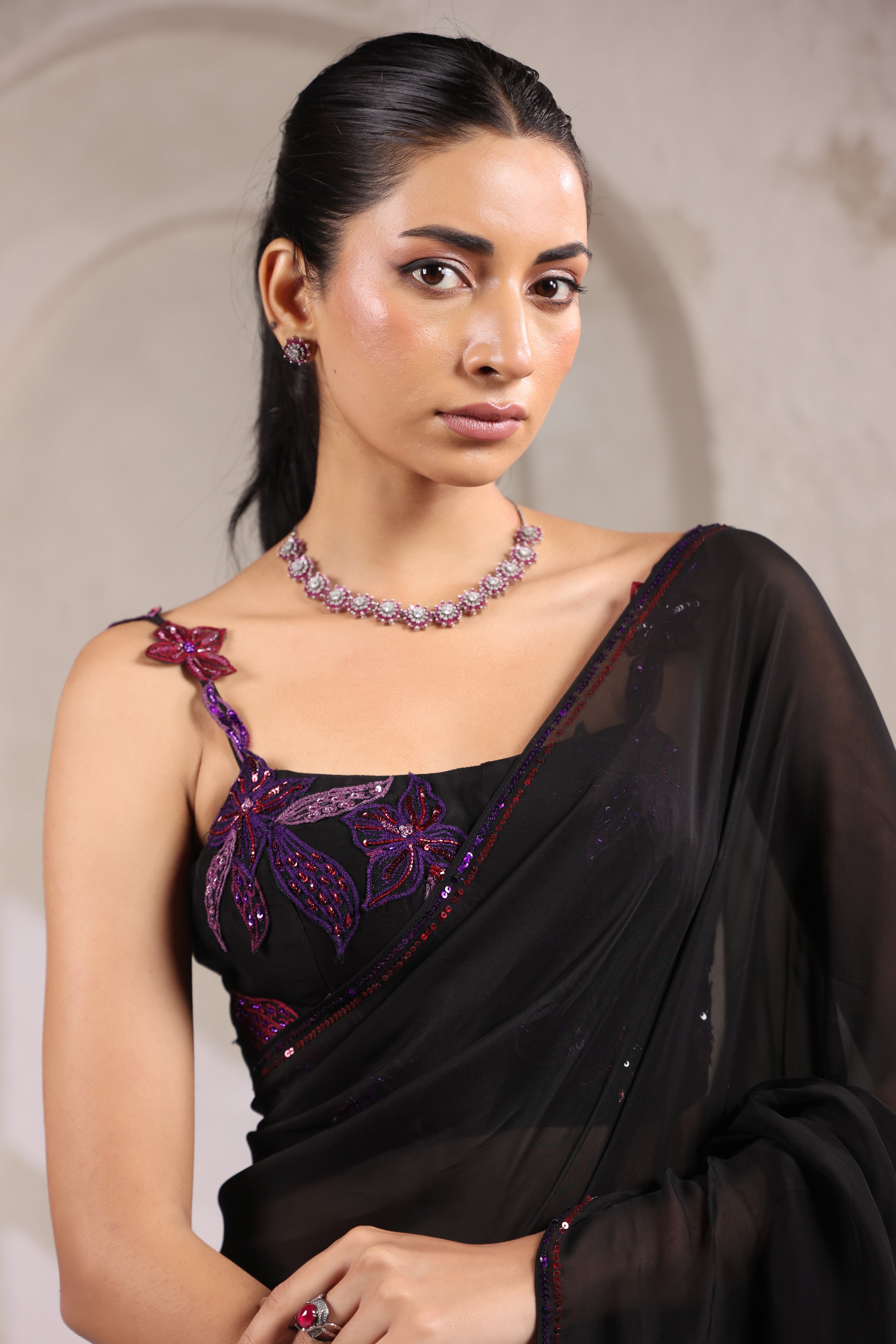 BLACK SAREE WITH SEQUIN DETAILING & STYLISH BLOUSE.