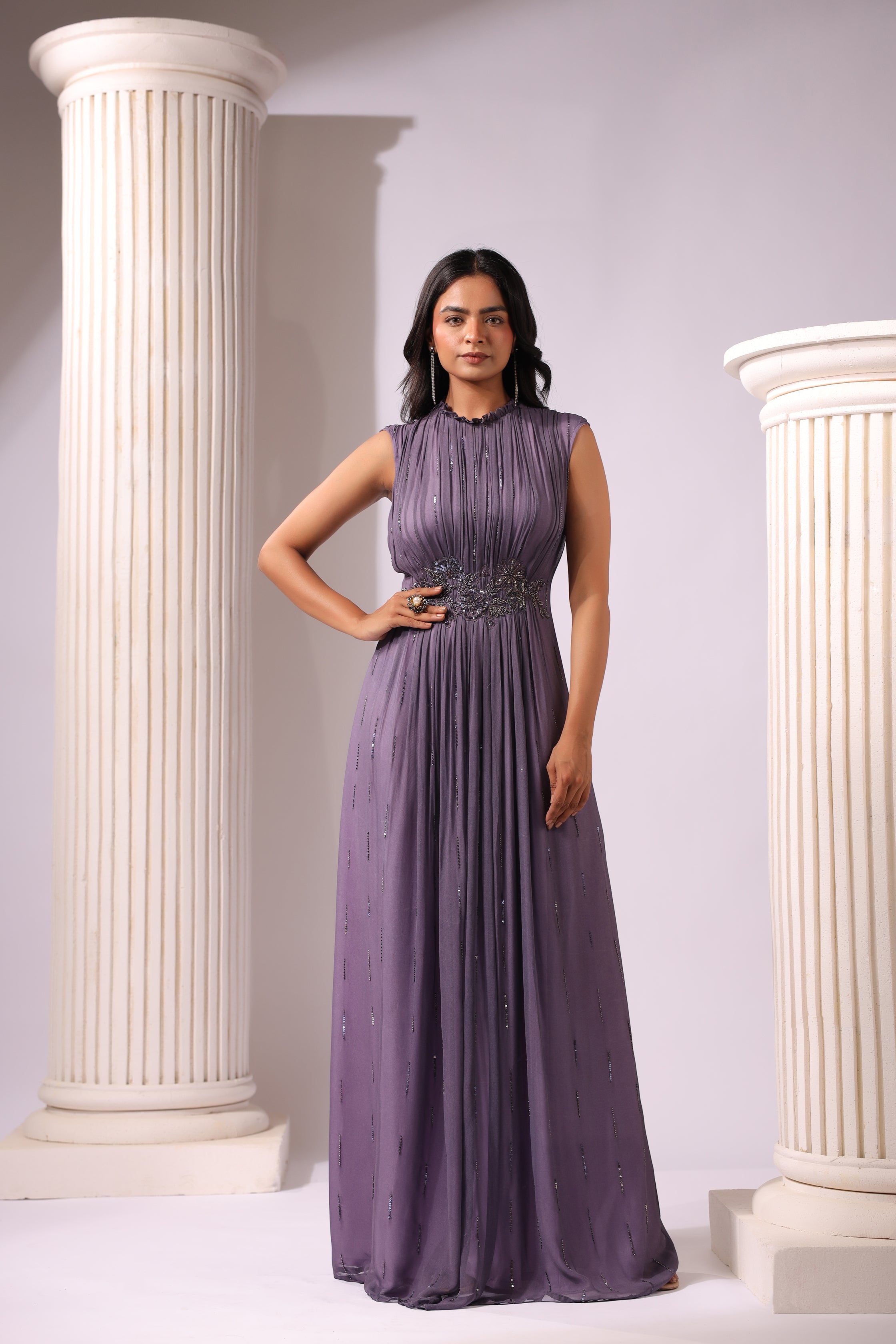 VOILET GEORGETTE GOWN WITH APPLIQUE FLOWERS AT THE WAIST