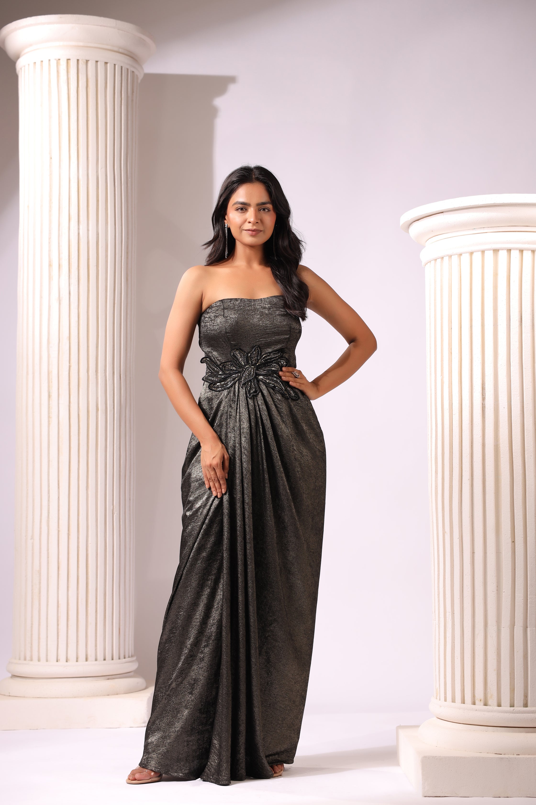 SHIMMER BLACK DRAPED GOWN WITH 3D APPLIQUE MOTIFS AROUND THE WAIST
