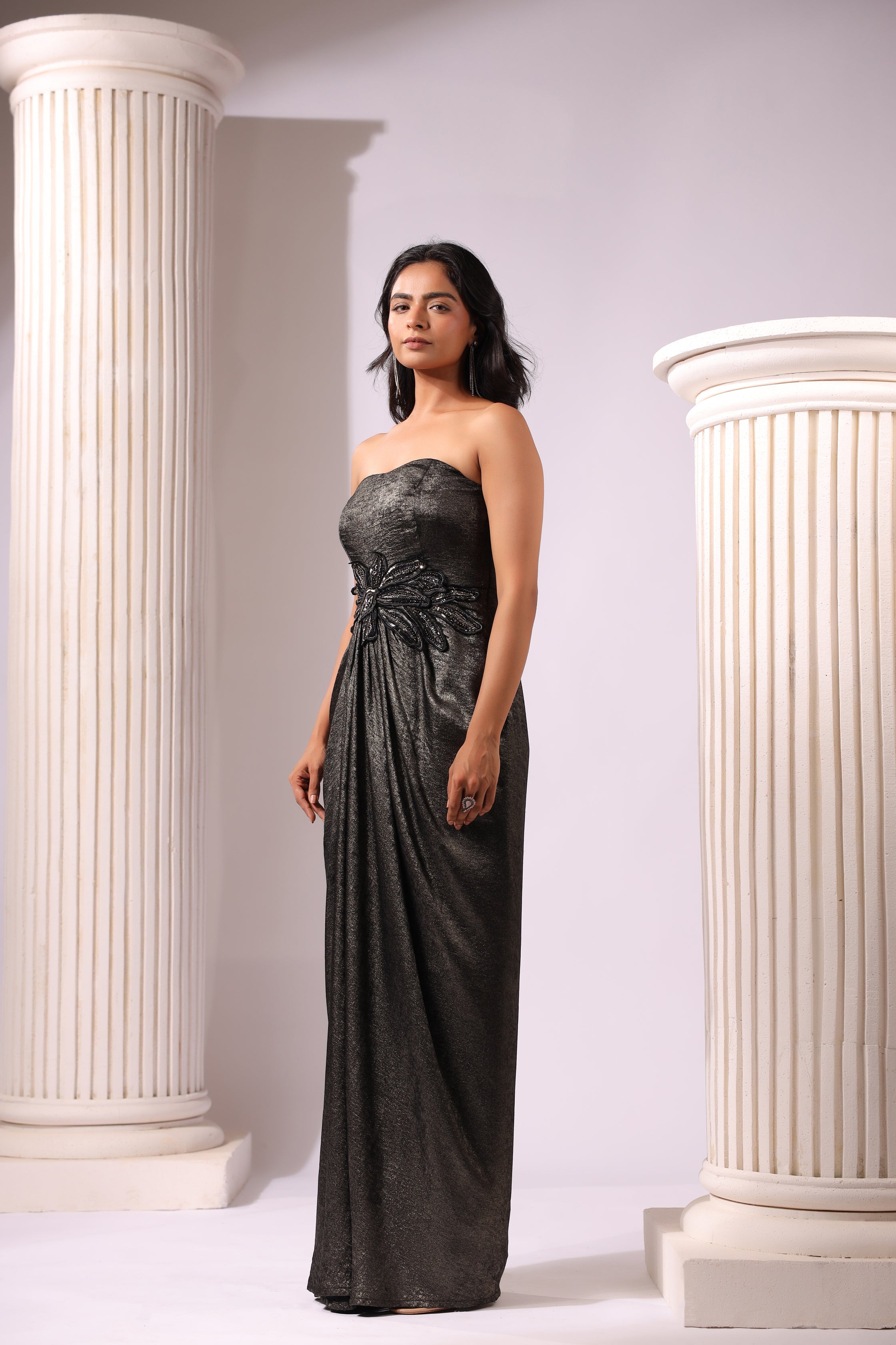 SHIMMER BLACK DRAPED GOWN WITH 3D APPLIQUE MOTIFS AROUND THE WAIST