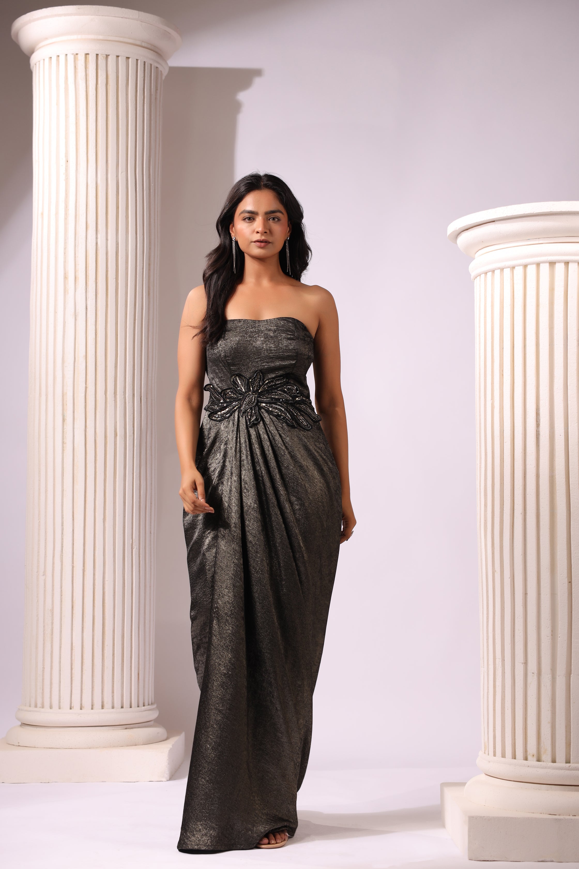 SHIMMER BLACK DRAPED GOWN WITH 3D APPLIQUE MOTIFS AROUND THE WAIST