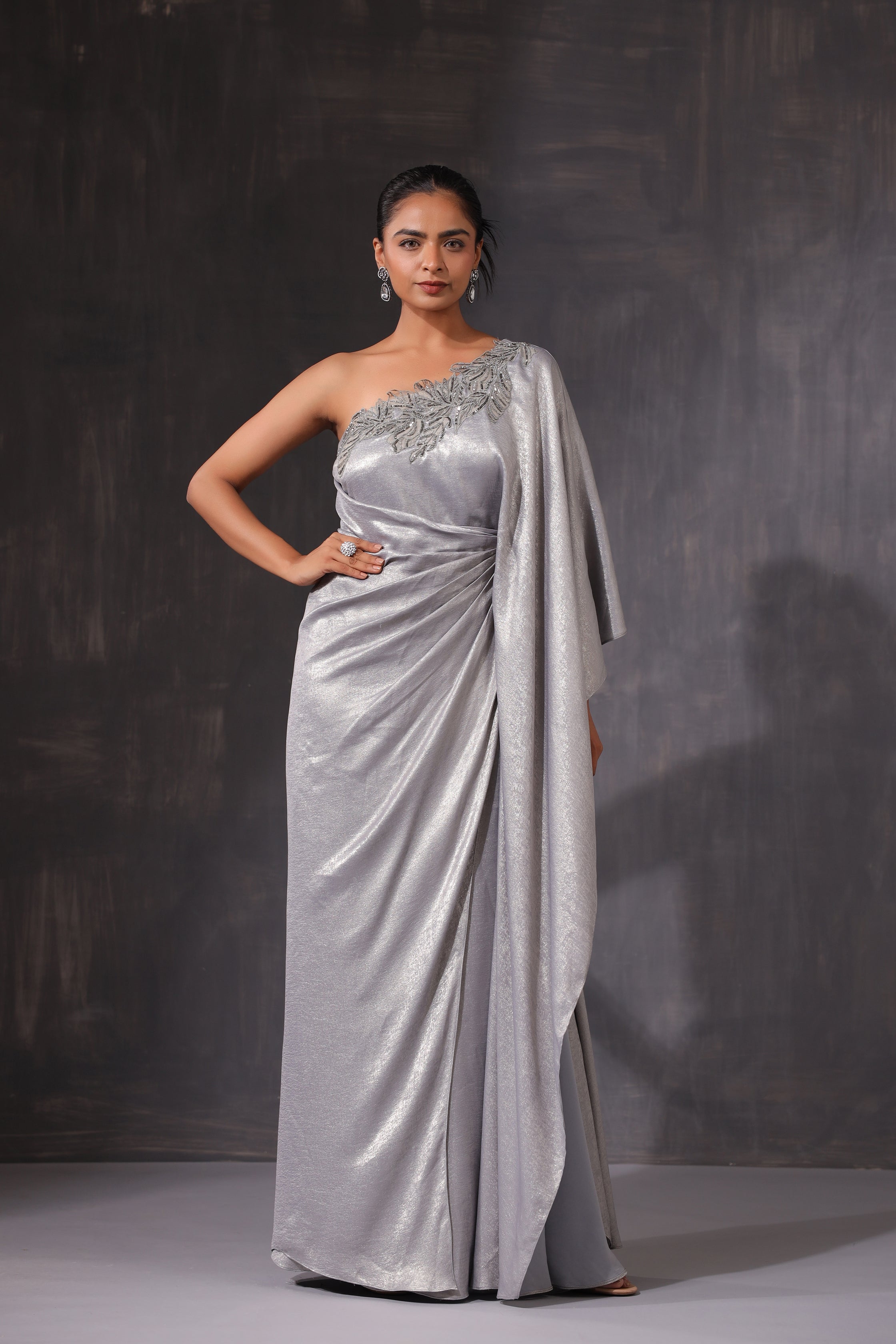 GREY SHIMMER ONE SHOULDER DRAPED GOWN WITH 3D APPLIQUE WORK