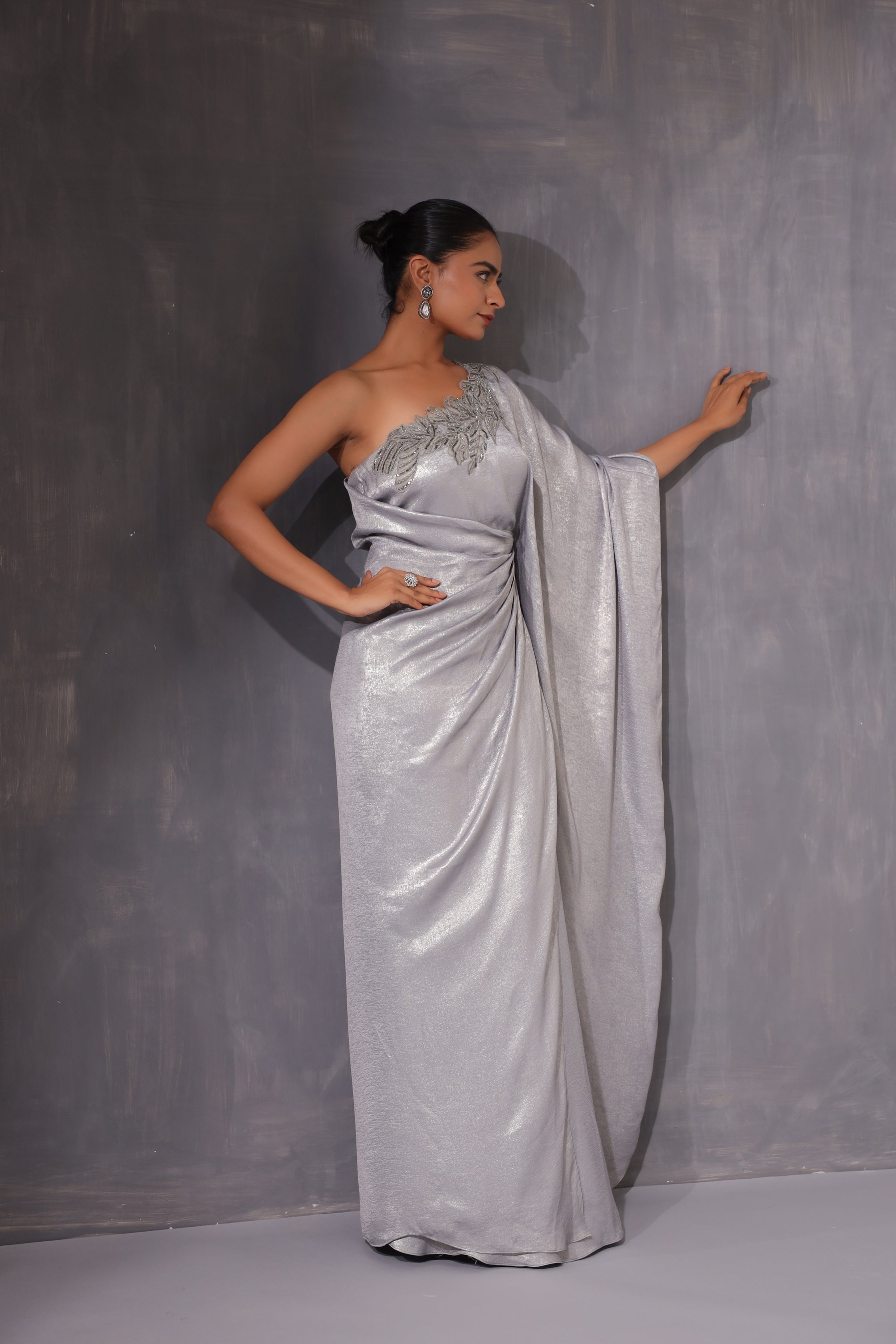 GREY SHIMMER ONE SHOULDER DRAPED GOWN WITH 3D APPLIQUE WORK