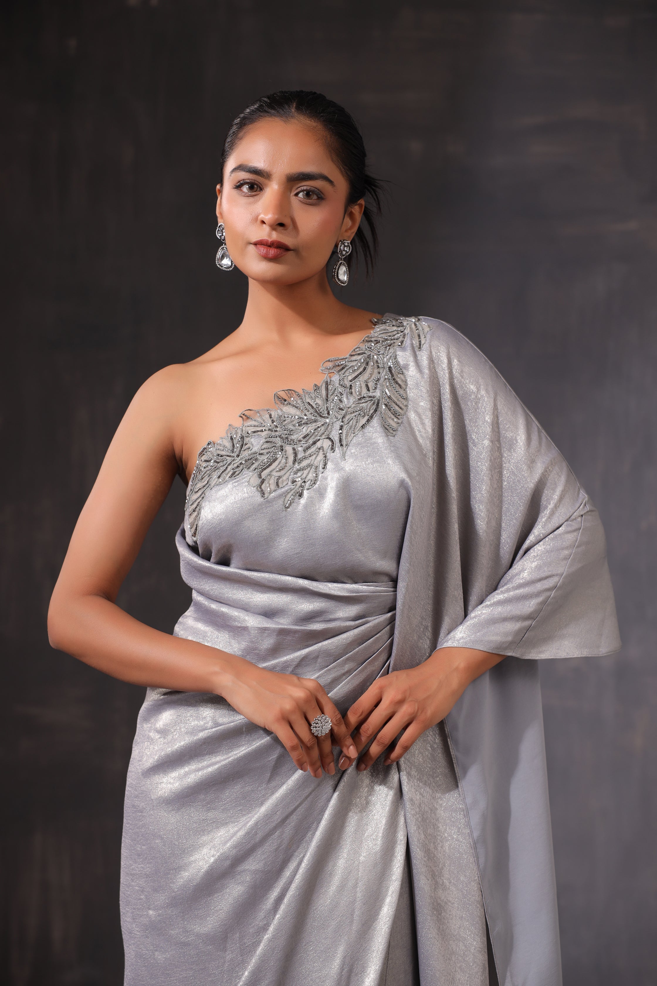 GREY SHIMMER ONE SHOULDER DRAPED GOWN WITH 3D APPLIQUE WORK