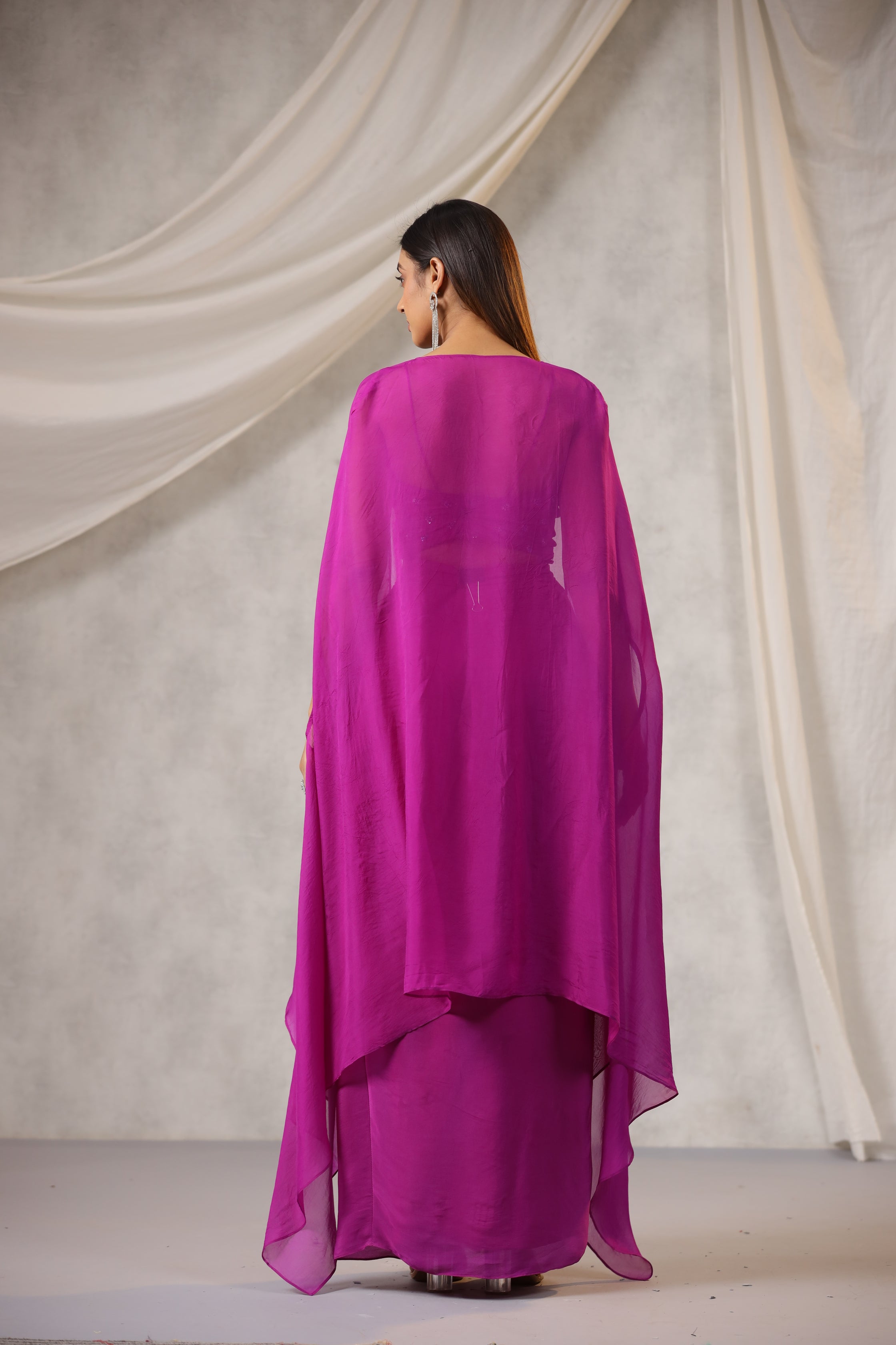 PURPLE EMBROIDERED BUSTIER WITH DRAPED SKIRT AND ORGANZA CAPE AND HAND WORK EDGING