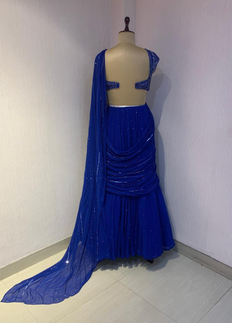 BLUE EMBELLISHED BLOUSE WITH DRAPED SAREE.