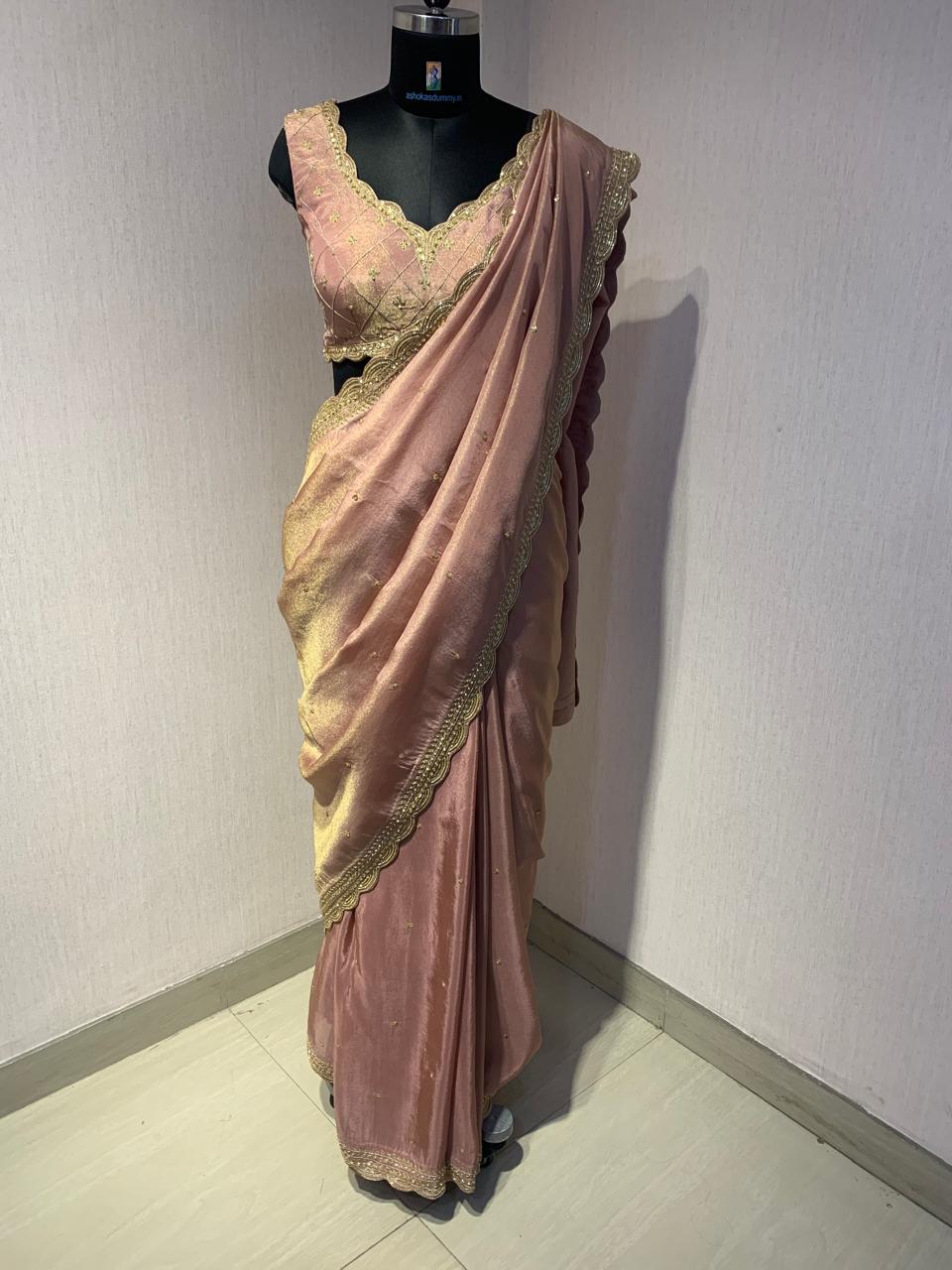 ELEGANT PINK SAREE WITH GOLDEN BORDER AND STYLISH BLOUSE.