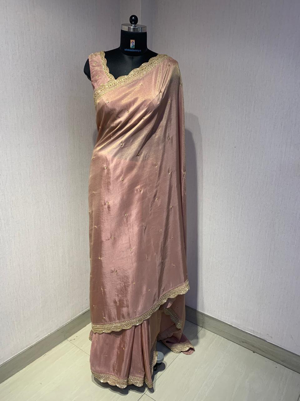 ELEGANT PINK SAREE WITH GOLDEN BORDER AND STYLISH BLOUSE.