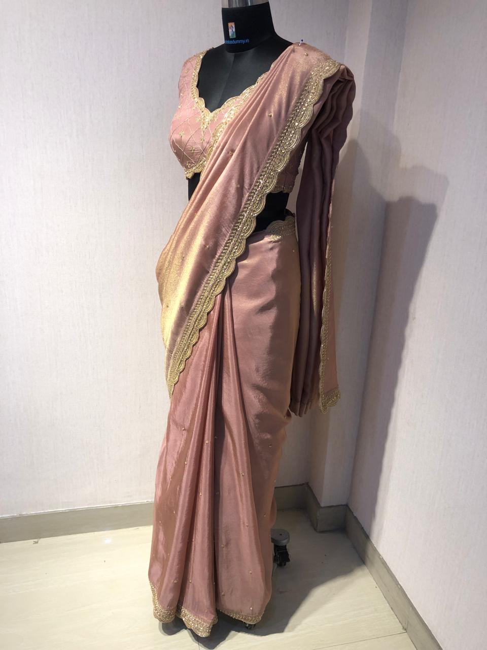 ELEGANT PINK SAREE WITH GOLDEN BORDER AND STYLISH BLOUSE.