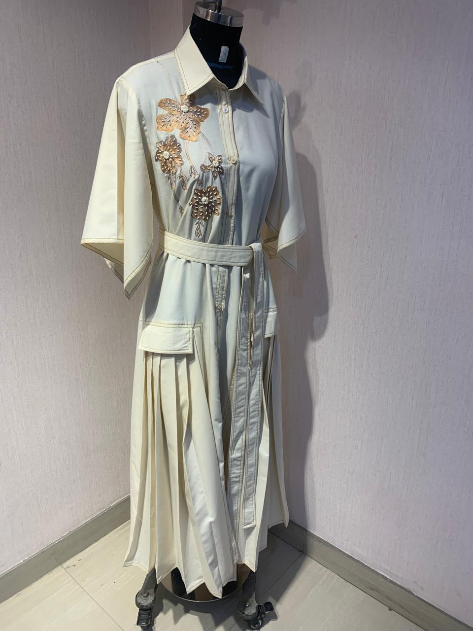 BUTTER YELLOW MIDI DRESS WITH FLORAL EMBROIDERY WITH BELT.