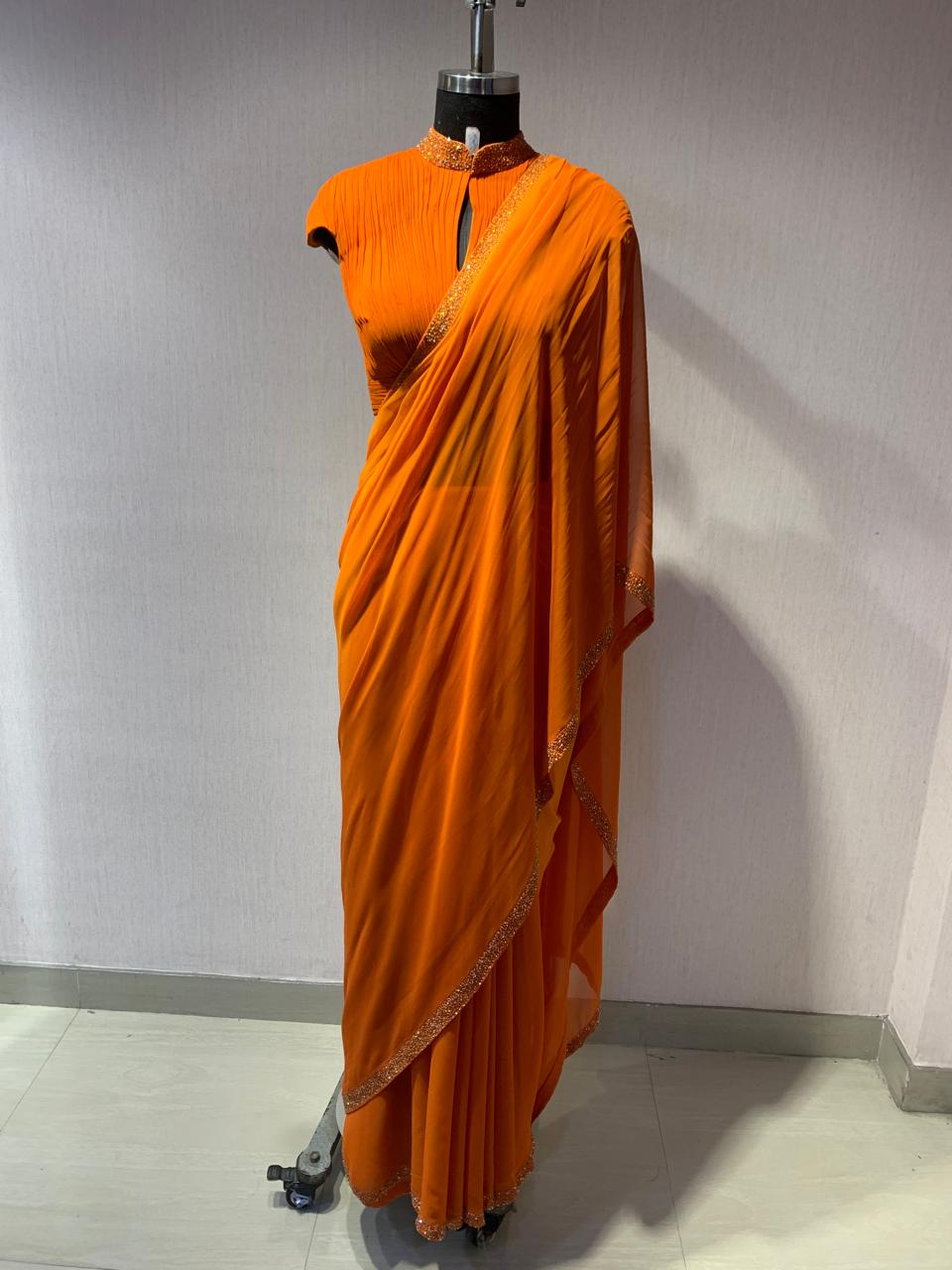 ORANGE DRAPED BLOUSE WITH OMBRE  SAREE.