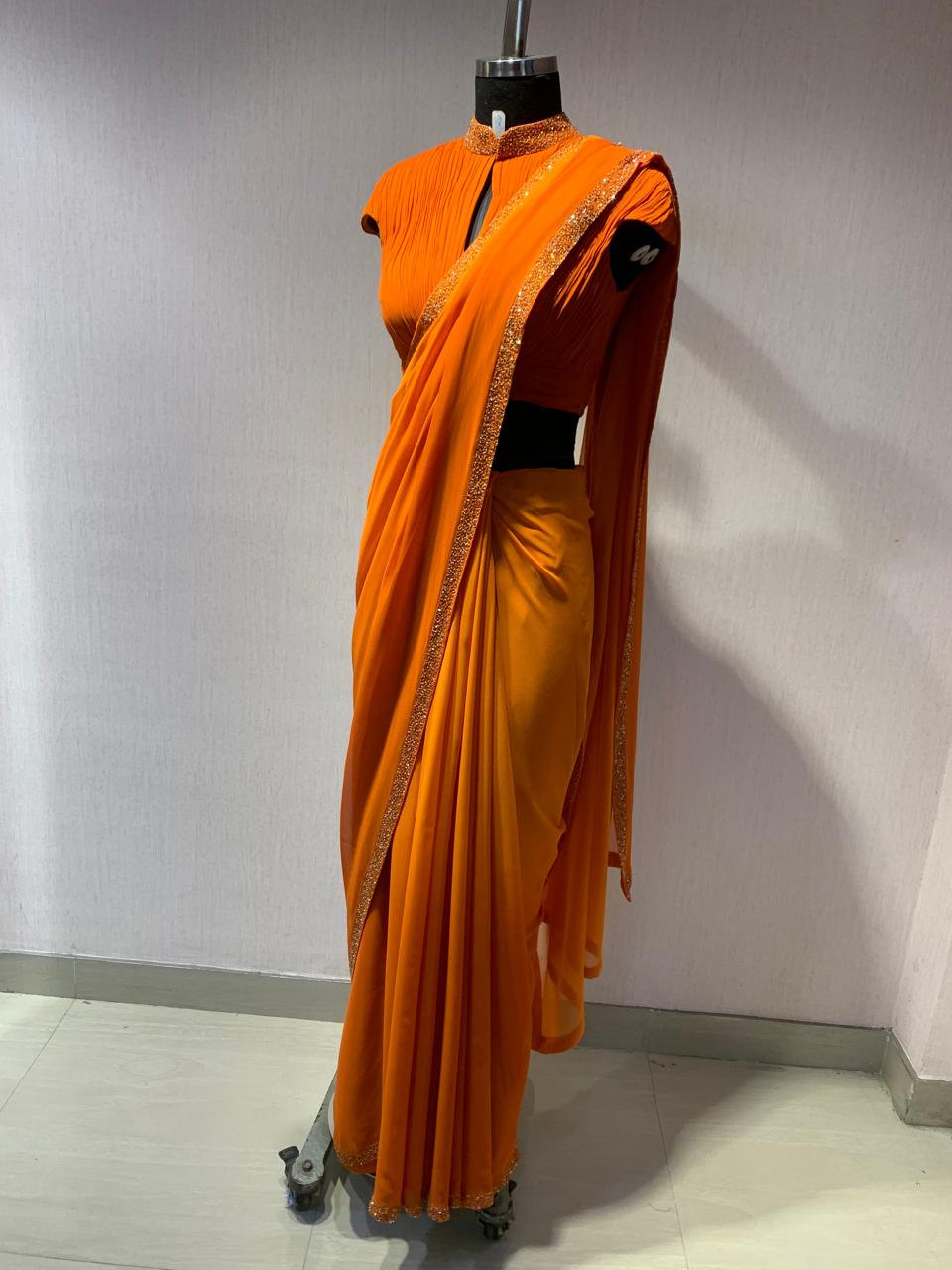 ORANGE DRAPED BLOUSE WITH OMBRE  SAREE.