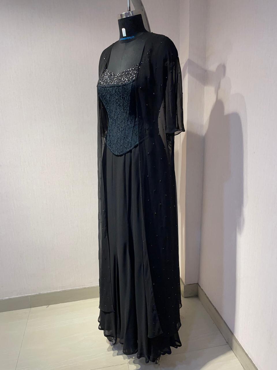 BLACK CORSET CAPE SET WITH FISH CUT SKIRT.