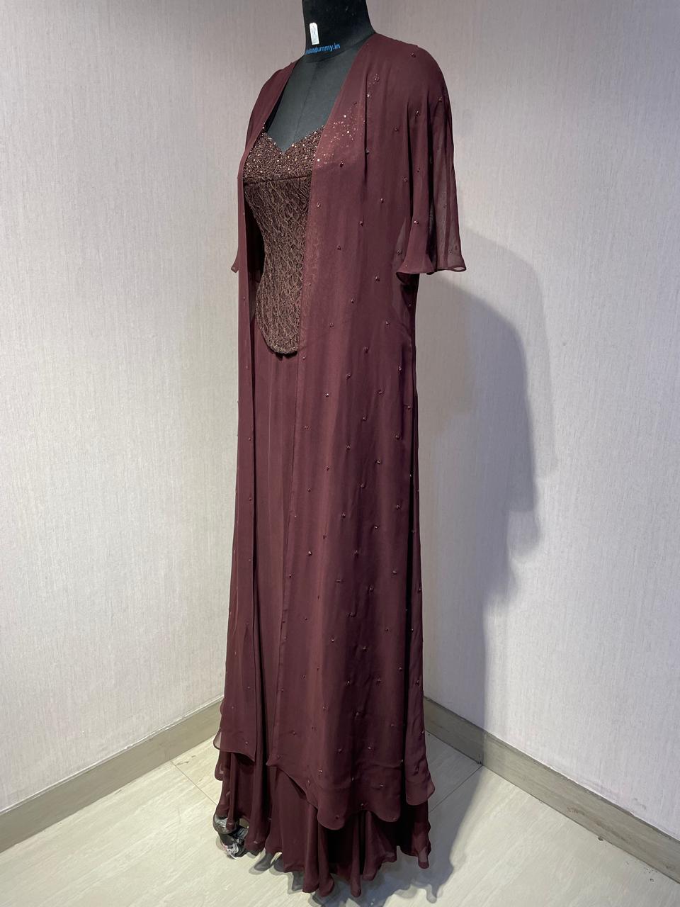 BROWN CORSET  CAPE SET WITH  FISH CUT SKIRT.