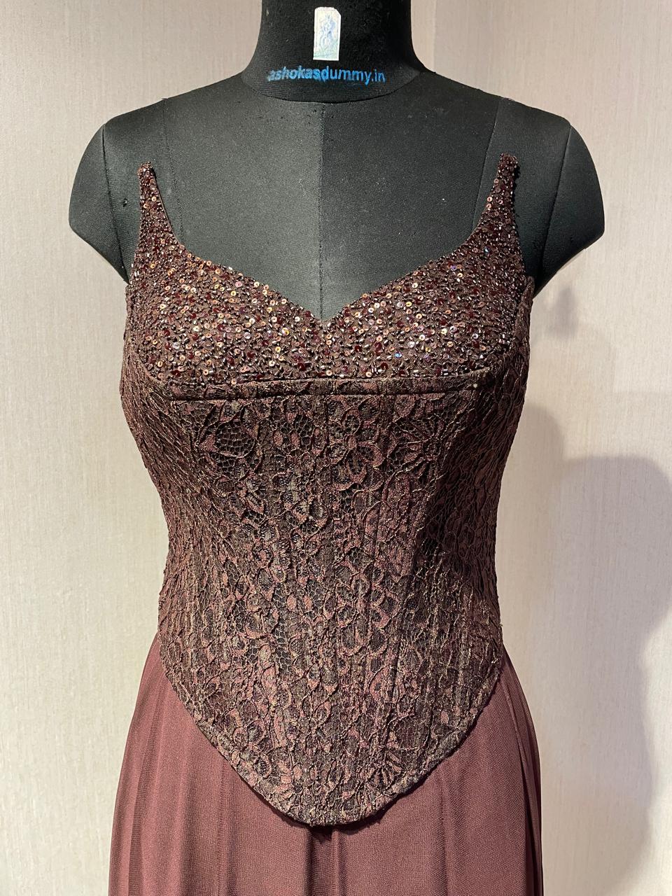 BROWN CORSET  CAPE SET WITH  FISH CUT SKIRT.