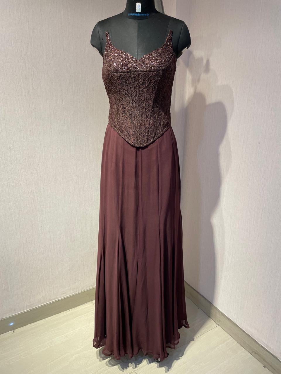 BROWN CORSET  CAPE SET WITH  FISH CUT SKIRT.