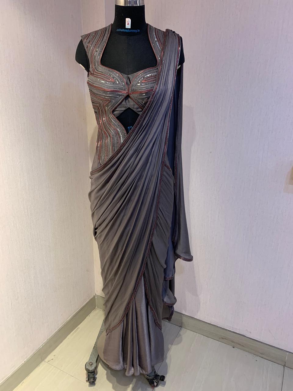 GREY SEQUIN AND EMBELLISHED PRE-DRAPED SAREE WITH DESIGNER CUT-OUT BLOUSE.