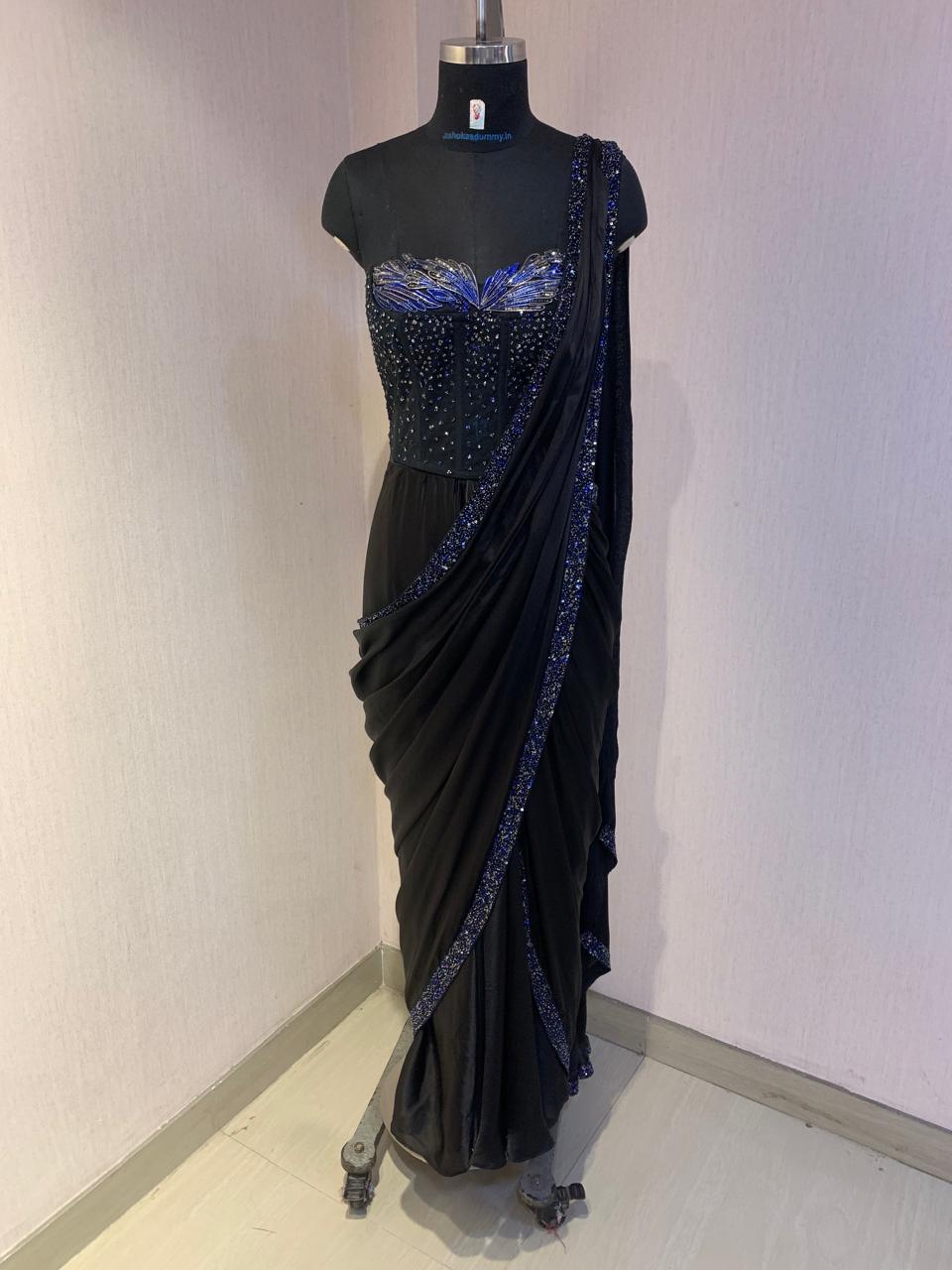 BLACK SEQUIN AND BEAD EMBELLISHED DRAPED SAREE WITH WIRE-WORK BUSTIER.