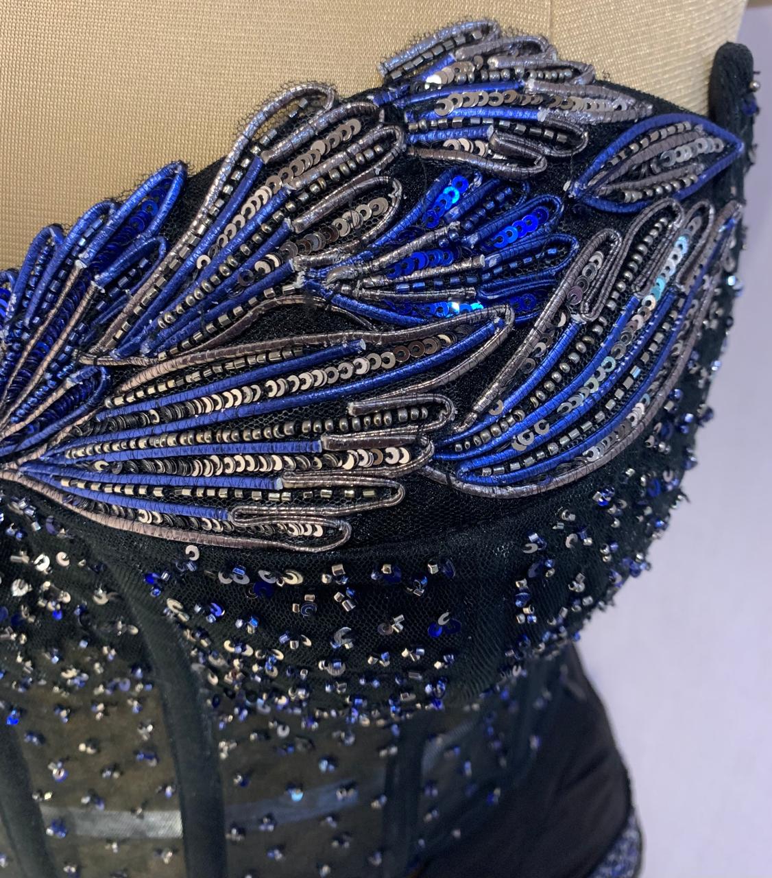 BLACK SEQUIN AND BEAD EMBELLISHED DRAPED SAREE WITH WIRE-WORK BUSTIER.