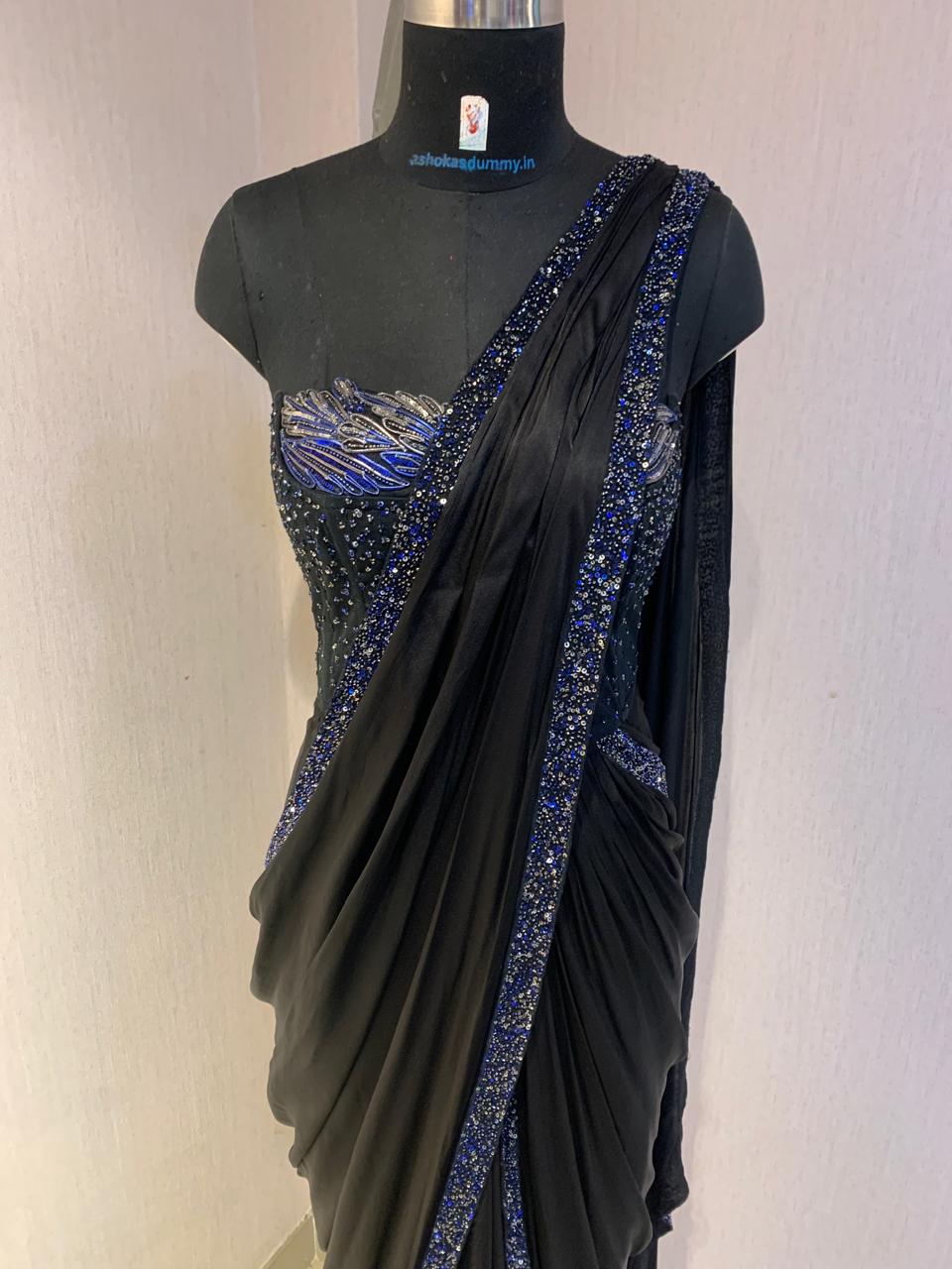 BLACK SEQUIN AND BEAD EMBELLISHED DRAPED SAREE WITH WIRE-WORK BUSTIER.