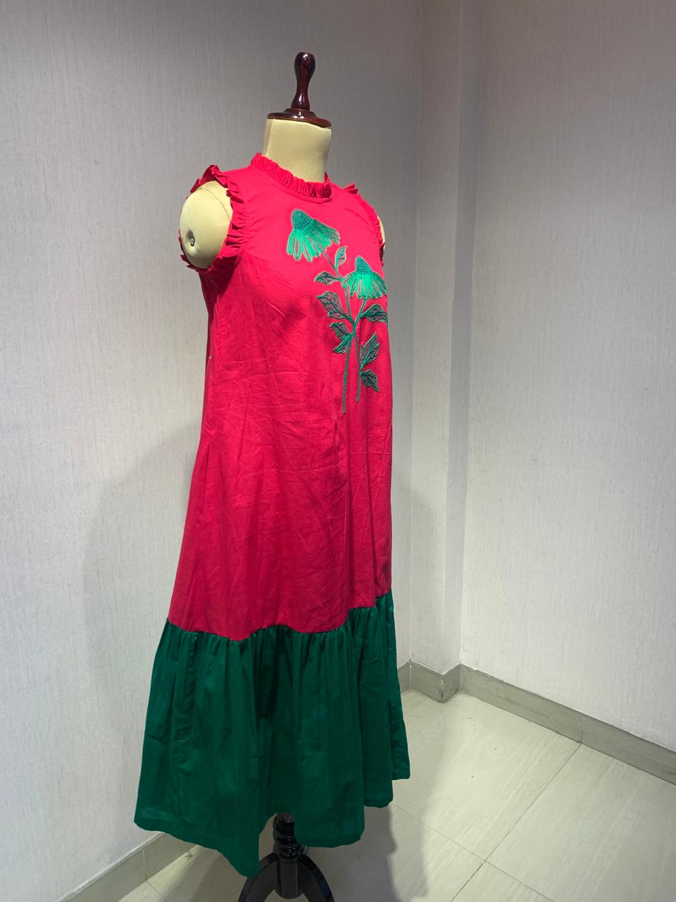 PINK GREEN HANDKERCHIEF HEM DRESS WITH FLORAL EMBROIDERY.