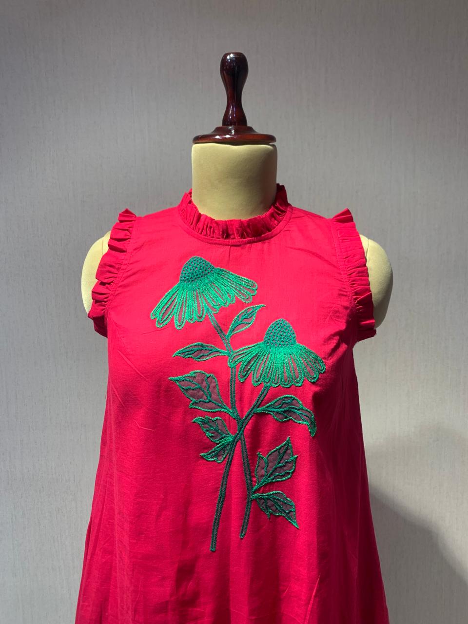 PINK GREEN HANDKERCHIEF HEM DRESS WITH FLORAL EMBROIDERY.