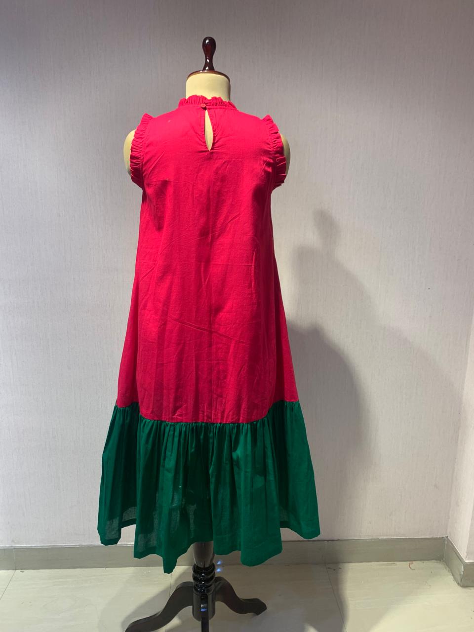PINK GREEN HANDKERCHIEF HEM DRESS WITH FLORAL EMBROIDERY.