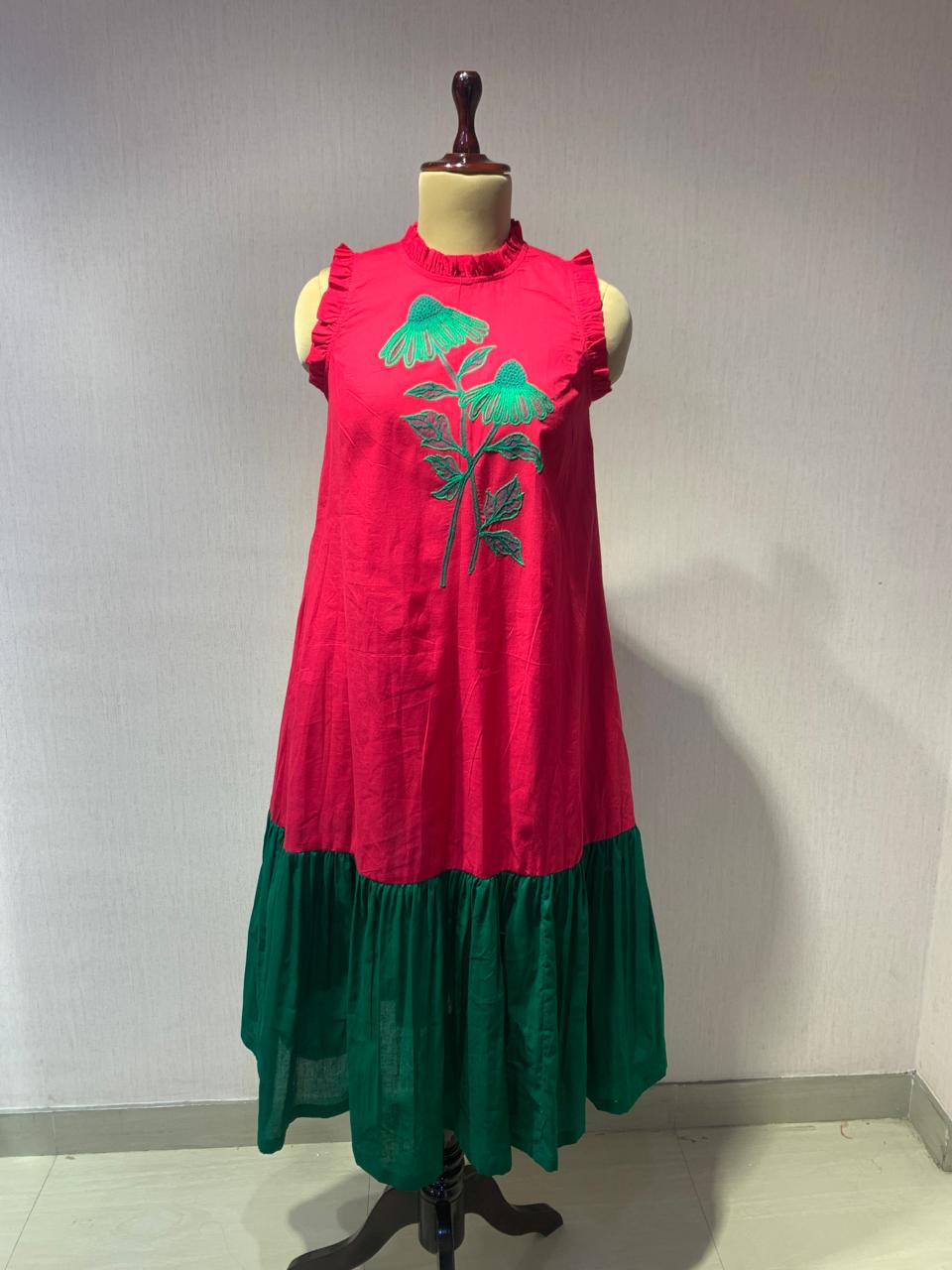 PINK GREEN HANDKERCHIEF HEM DRESS WITH FLORAL EMBROIDERY.