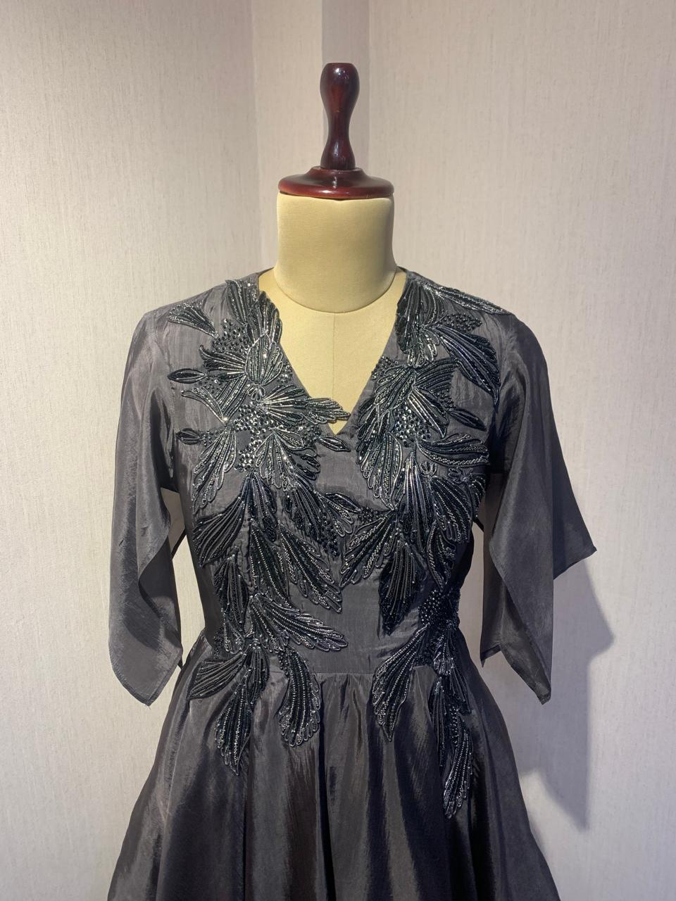 STYLISH GREY DRESS WITH ELEGANT  EMBROIDERY ON THE FRONT.