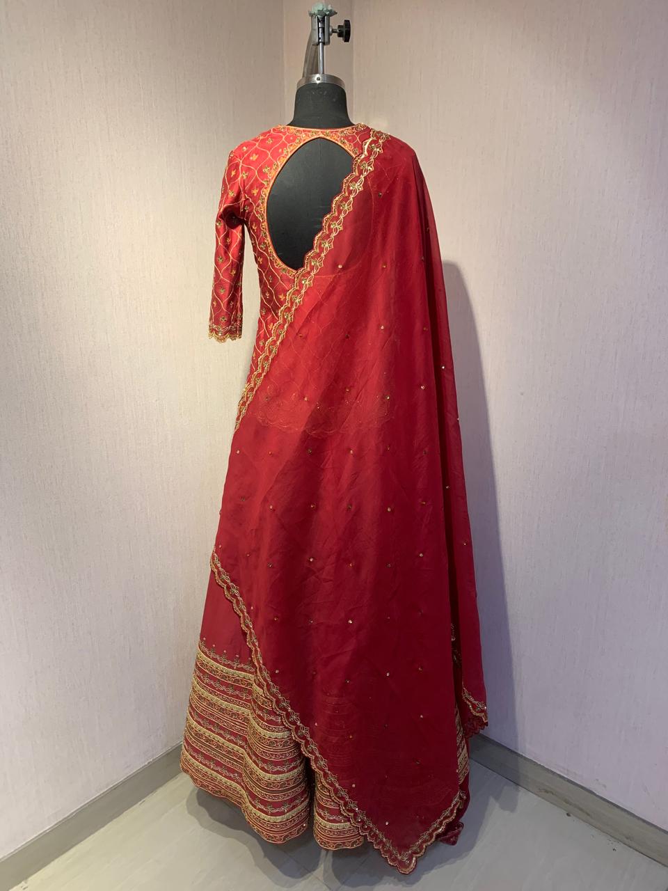 MAROON EMBROIDERED LEHENGA SET WITH BLOUSE AND DUPATTA.