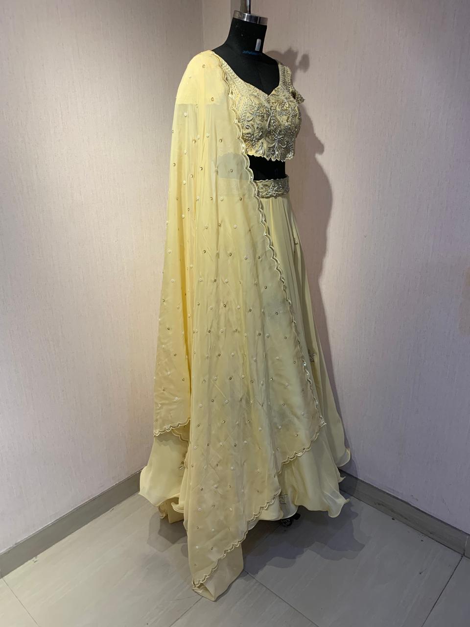 YELLOW EMBROIDERED LEHENGA BLOUSE WITH DUPATTA.