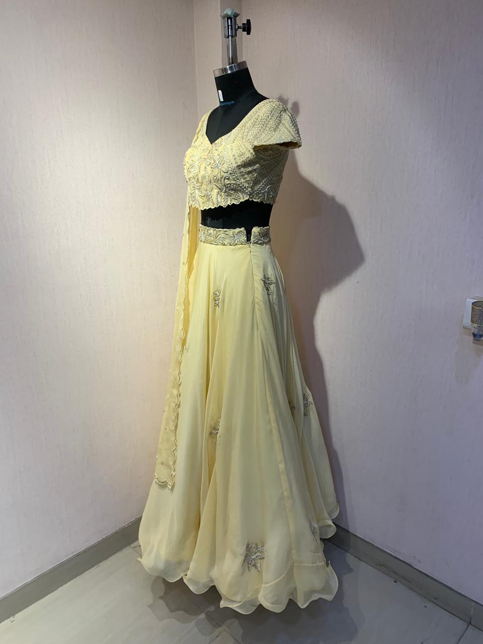 YELLOW EMBROIDERED LEHENGA BLOUSE WITH DUPATTA.