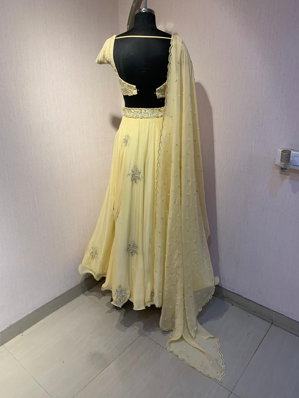 YELLOW EMBROIDERED LEHENGA BLOUSE WITH DUPATTA.