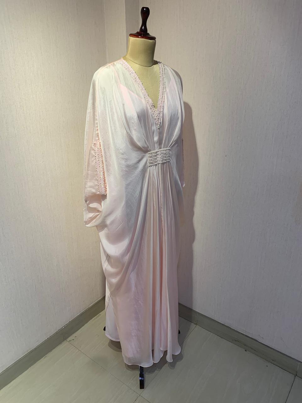 ONION PINK KAFTAN WITH EMBROIDERED NECKLINE WAIST AND SLEEVES.
