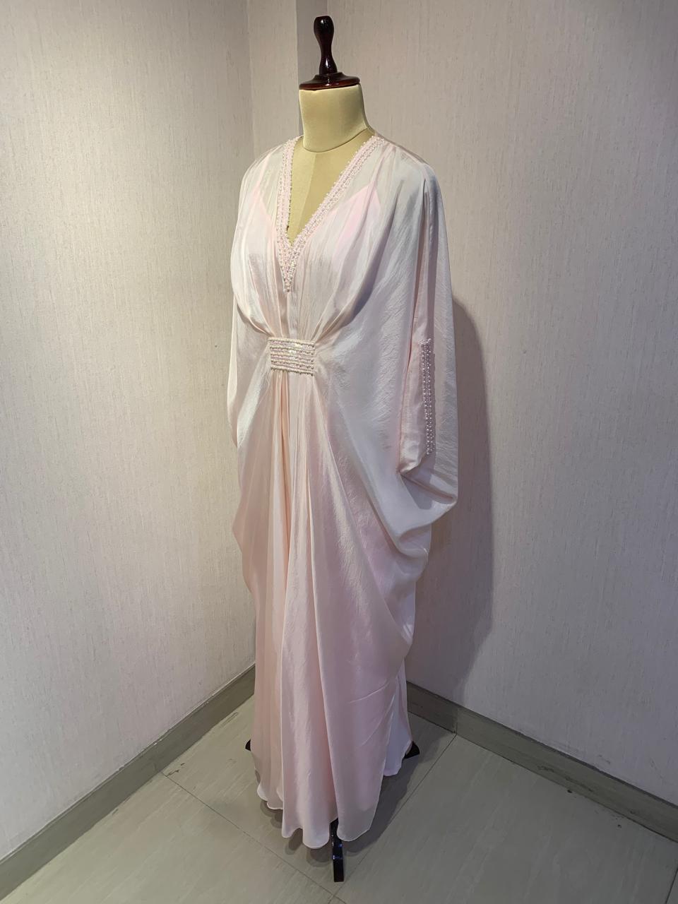 ONION PINK KAFTAN WITH EMBROIDERED NECKLINE WAIST AND SLEEVES.