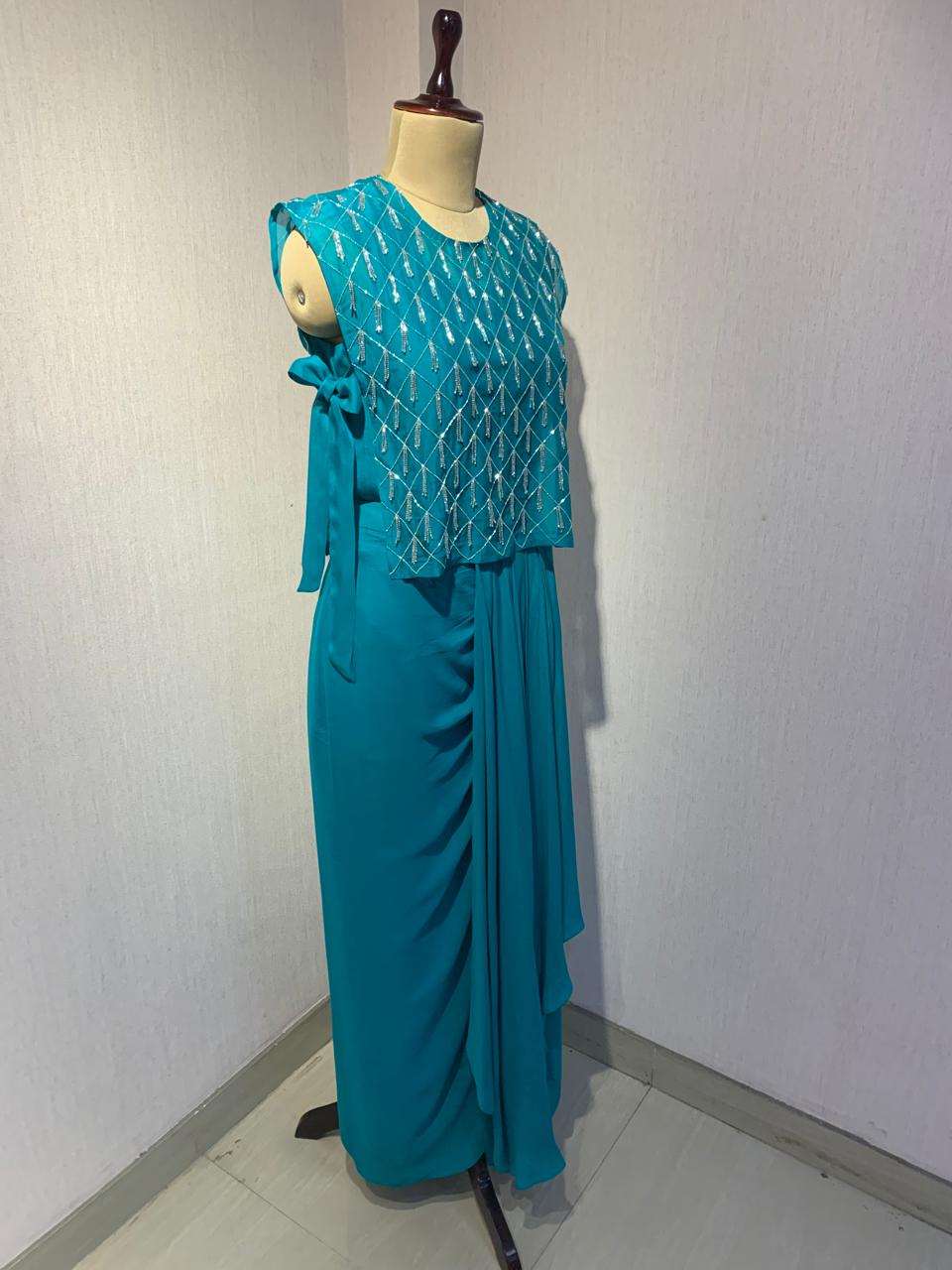 ELEGANT TEAL HAND-EMBELLISHED OVERLAY TOP WITH INNER & DRAPED SKIRT.