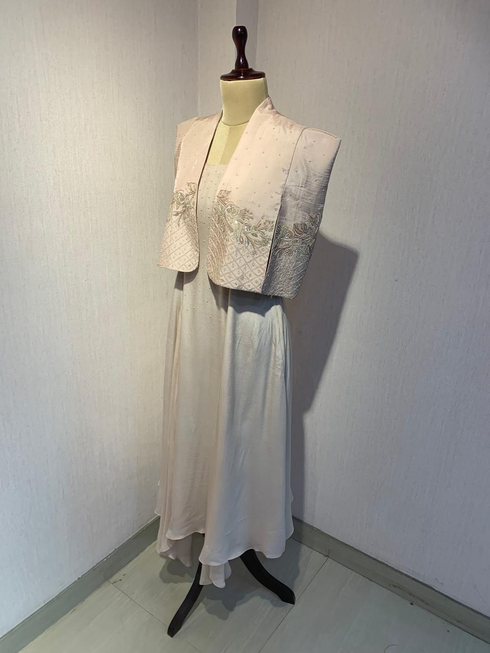 HAND-EMBROIDERED JACKET WITH SLEEVELESS MAXI DRESS.