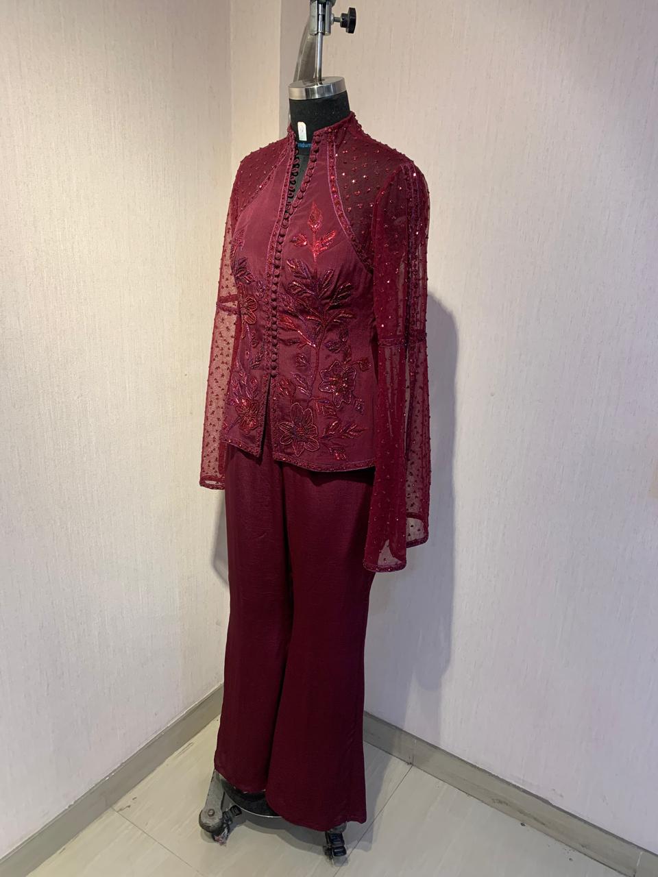 MAROON HAND-EMBROIDERED SHEER JACKET TOP WITH WIDE-LEG PANTS.