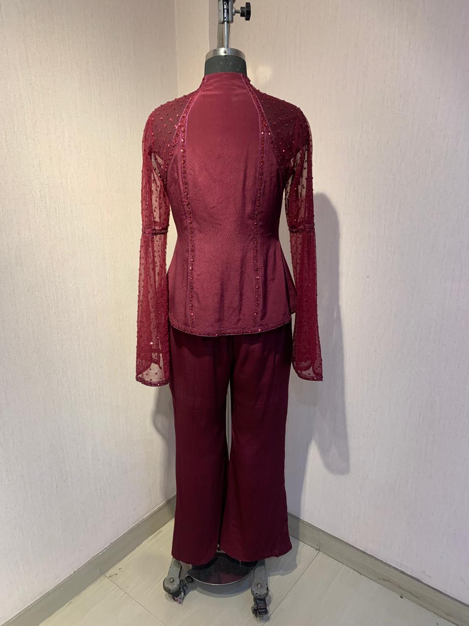 MAROON HAND-EMBROIDERED SHEER JACKET TOP WITH WIDE-LEG PANTS.