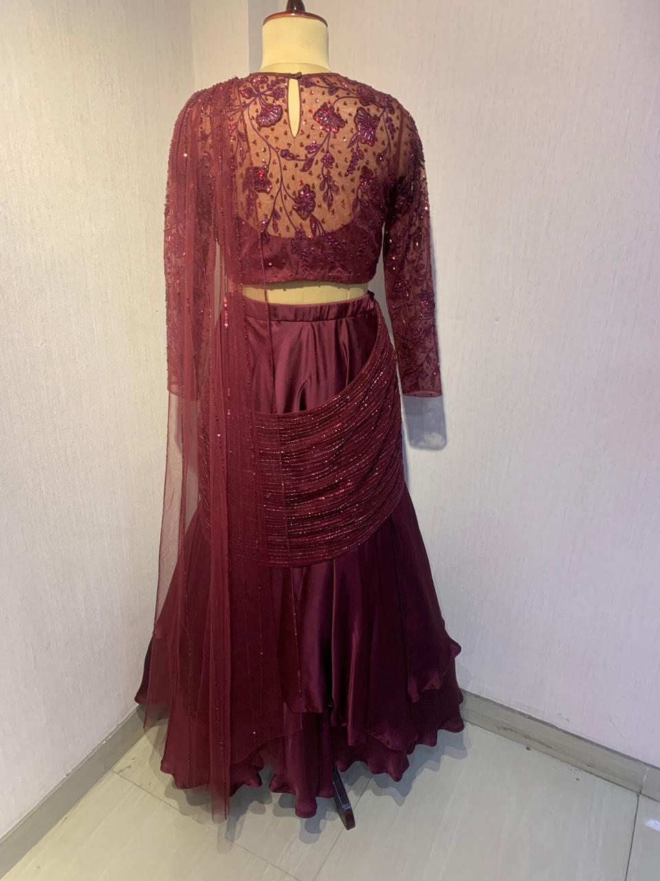 WINE EMBELLISHED LEHENGA SET WITH DRAPE DETAIL.