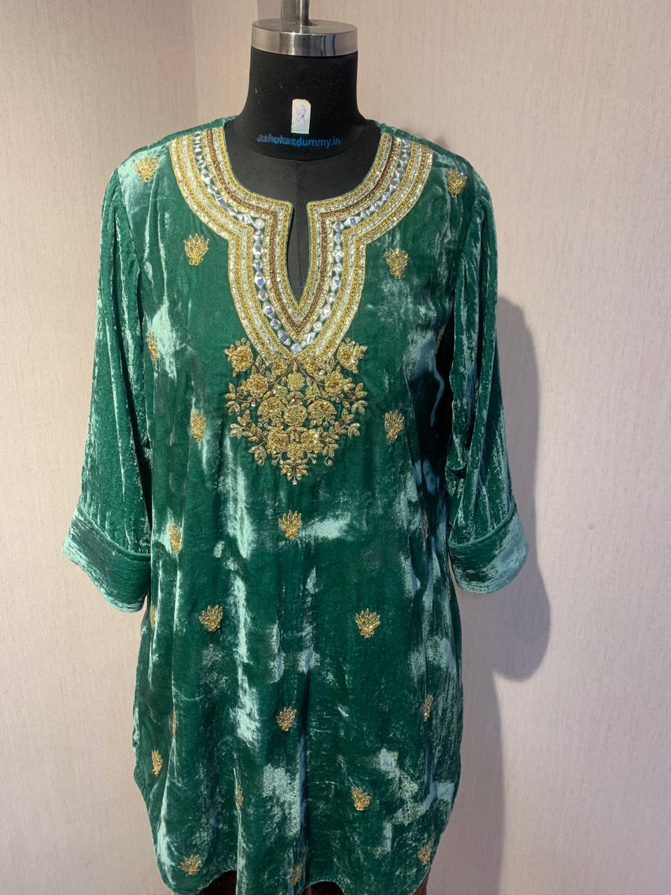 EMERALD VELVET KURTA WITH BROWN EMBROIDERED PANTS.