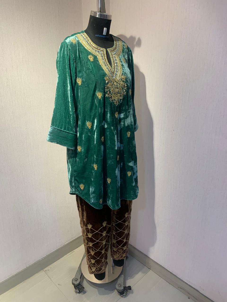 EMERALD VELVET KURTA WITH BROWN EMBROIDERED PANTS.