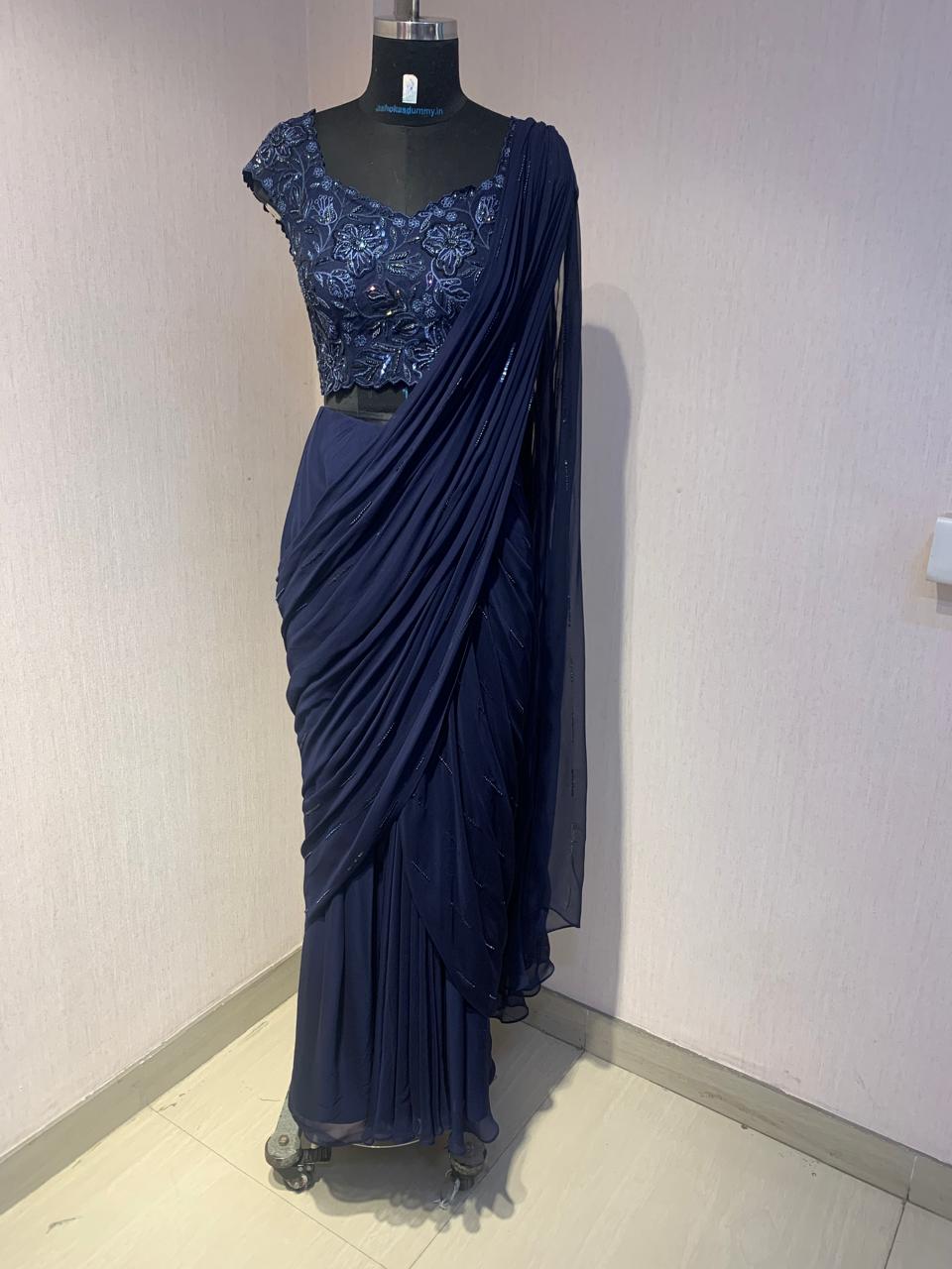 NAVY BLUE DRAPE SAREE WITH EMBROIDERED BLOUSE.