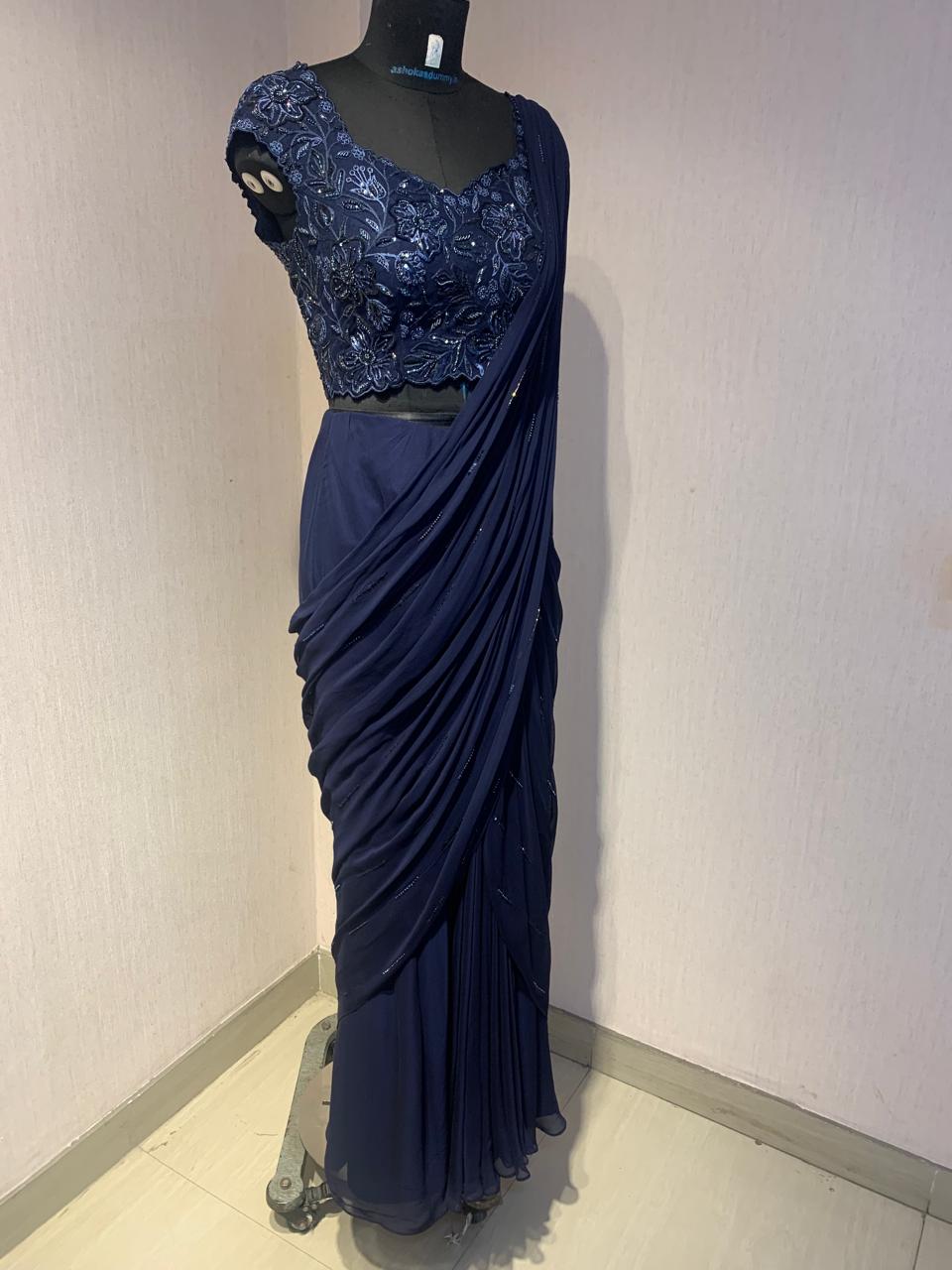 NAVY BLUE DRAPE SAREE WITH EMBROIDERED BLOUSE.