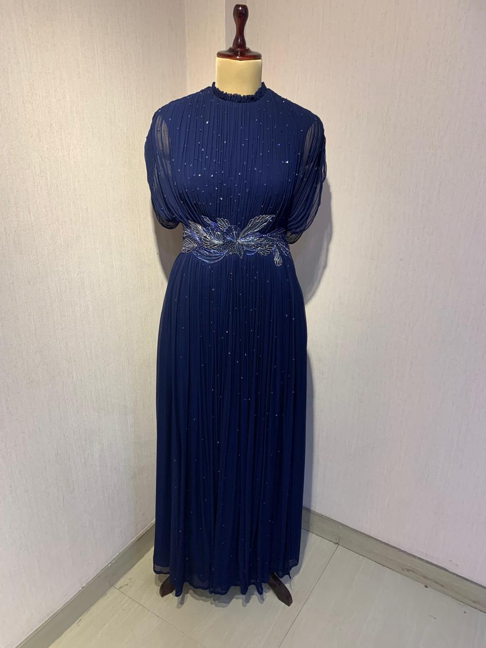 BLUE WIRE EMBELLISHED PLEATED GOWN WITH SHEER SLEEVES.