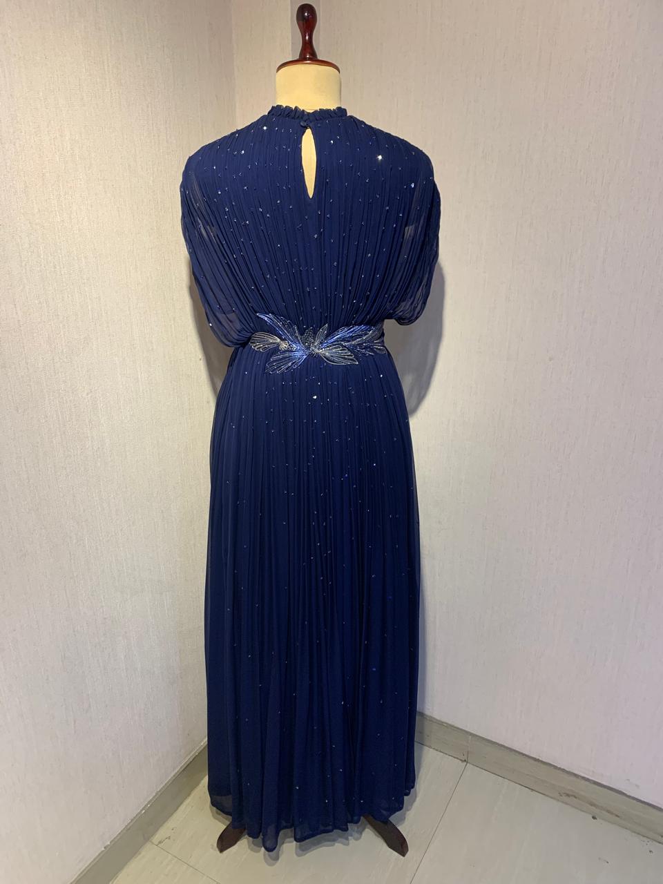 BLUE WIRE EMBELLISHED PLEATED GOWN WITH SHEER SLEEVES.