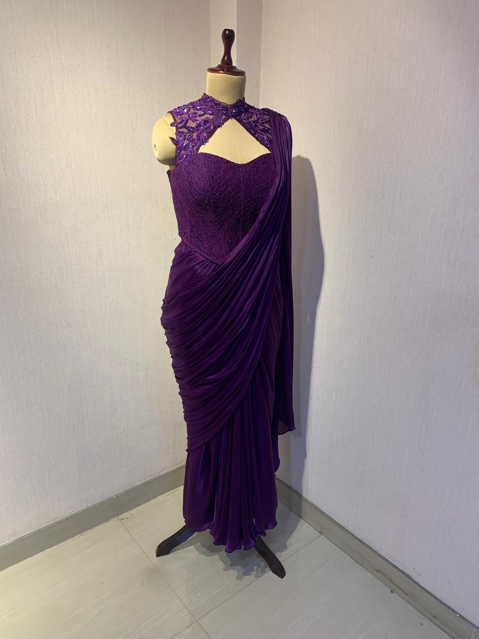 EMBROIDERED BLOUSE WITH SEPARATE DRAPE SAREE.