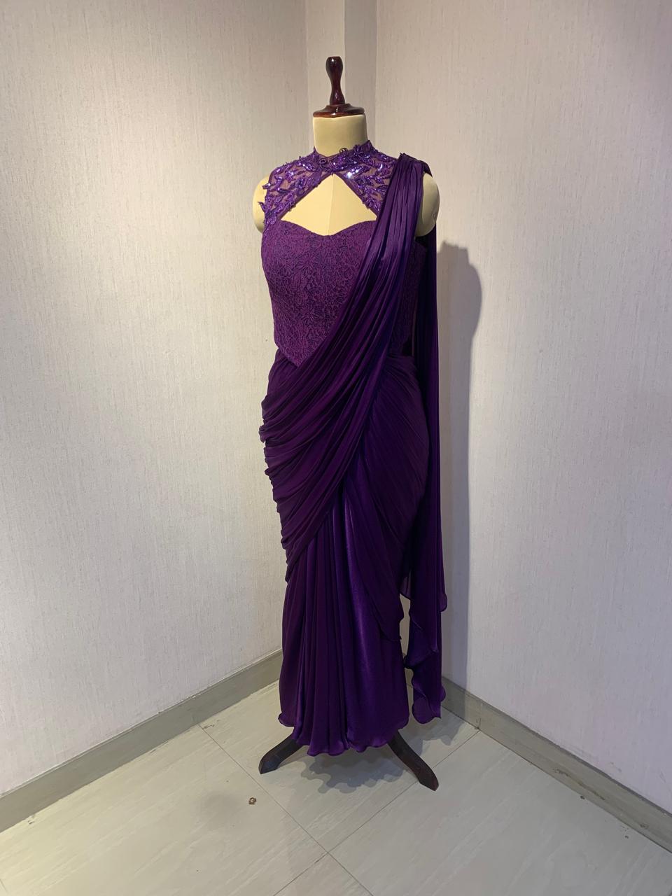 EMBROIDERED BLOUSE WITH SEPARATE DRAPE SAREE.