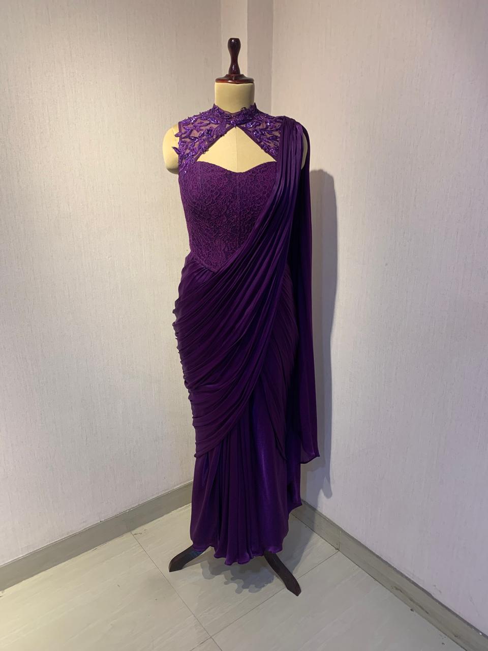 EMBROIDERED BLOUSE WITH SEPARATE DRAPE SAREE.