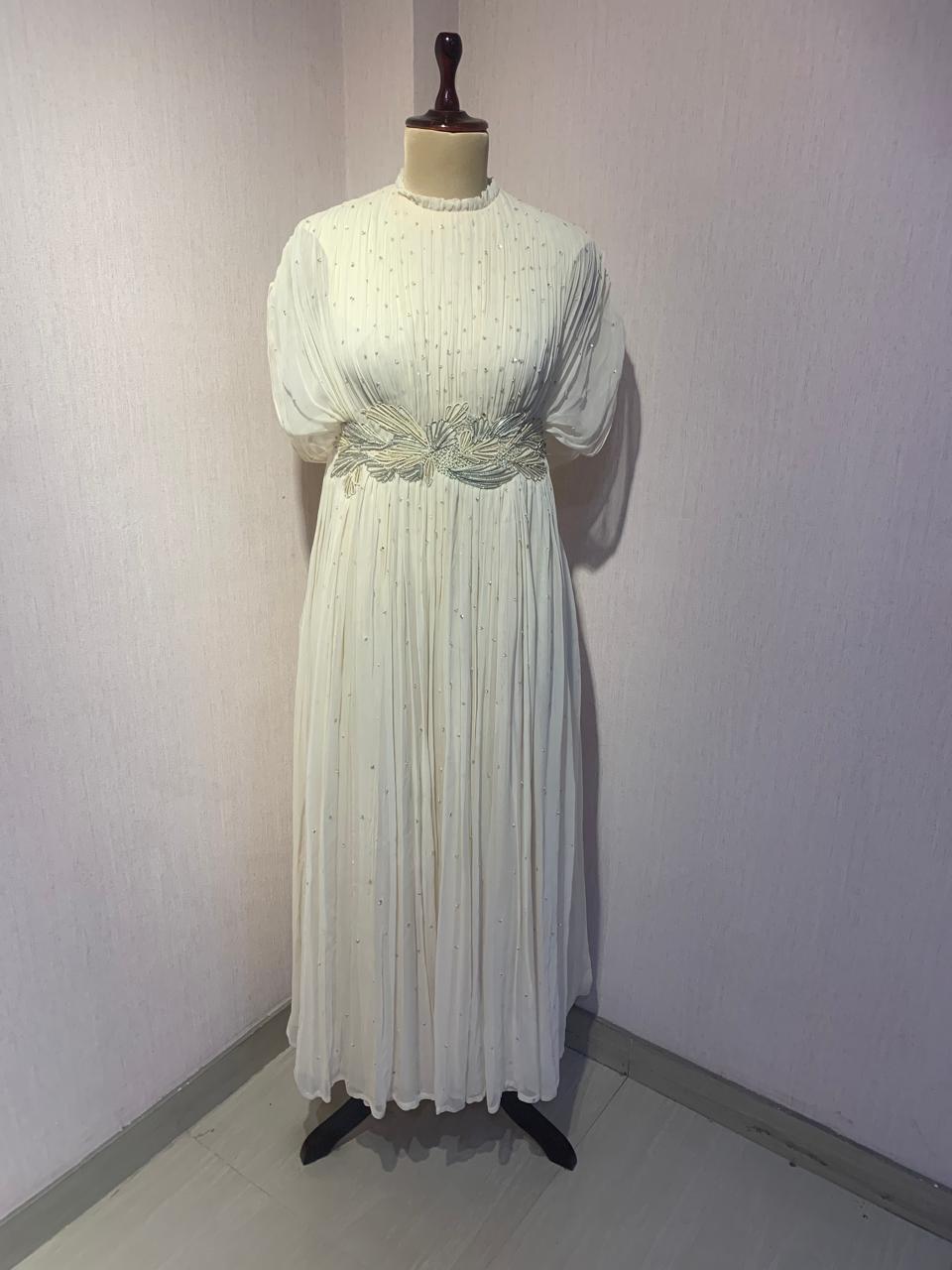 OFF WHITE WIRE EMBELLISHED PLEATED GOWN.